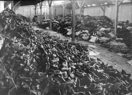 An Auschwitz  warehouse filled with shoes and clothing from those who were gassed upon arrival.  Image courtesy of USHMM Photo Archives via http://fcit.usf.edu/holocaust